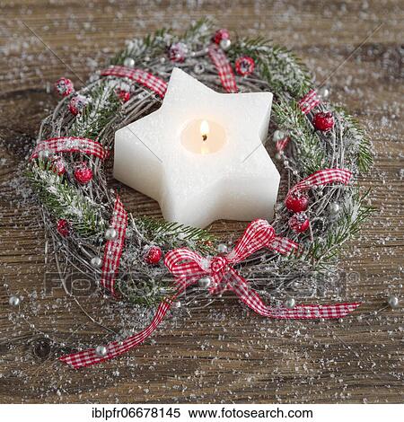 Natural advent decoration with wreath and star shaped candle View Large Photo Image Stock Photography - Natural advent decoration with wreath and star shaped candle. Fotosearch