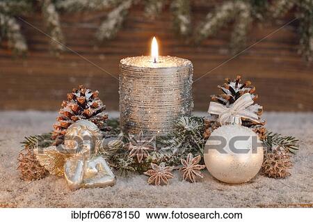 Natural Christmas decoration with candle View Large Photo Image Stock Image - Natural Christmas decoration with candle. Fotosearch