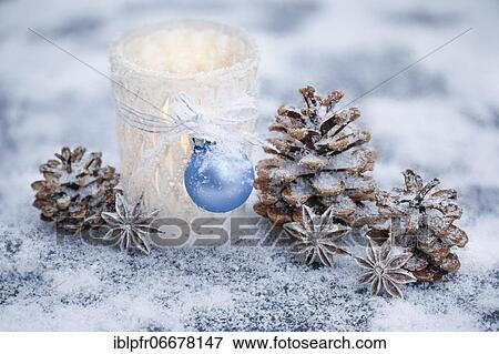 Stock Photo - Natural outdoor Advent decoration with ice and snow. Fotosearch