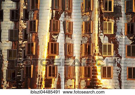 Stock Image - Neuer Zollhof, facades Gehry building, detail in evening light, Düsseldorf, Nordrhein Westfalen, Germany, Europe. Fotosearch