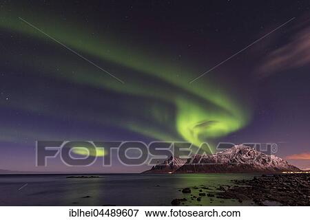 Northern lights over Ramberg, Lofoten, Norway, Europe View Large Photo Image Stock Photo - Northern lights over Ramberg, Lofoten, Norway, Europe. Fotosearch