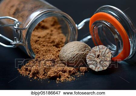 Nutmegs and nutmeg powder in glass containers, ground, grated ( Myristica fragrans) View Large Photo Image Stock Photo - Nutmegs and nutmeg powder in glass containers, ground, grated ( Myristica fragrans). Fotosearch