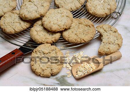 Oatmeal biscuits, oatmeal in scoop, oatmeal cookies, oatmeal biscuits View Large Photo Image Stock Photo - Oatmeal biscuits, oatmeal in scoop, oatmeal cookies, oatmeal biscuits. Fotosearch