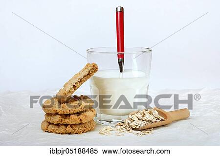 Oatmeal biscuits, oatmeal in scoop, glass of milk, oatmeal biscuits, oatmeal cookie View Large Photo Image Stock Photography - Oatmeal biscuits, oatmeal in scoop, glass of milk, oatmeal biscuits, oatmeal cookie. Fotosearch