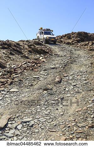 Off-road vehicle in Divorce Pass, Damaraland, Kunene Region, Namibia, Africa View Large Photo Image Stock Image - Off-road vehicle in Divorce Pass, Damaraland, Kunene Region, Namibia, Africa. Fotosearch