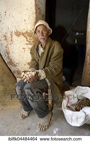 Old man, farmer with potatoes, Avarabohitra Fenomanano village, Tsiroanomandidy district, Bongolava region, Madagascar, Africa View Large Photo Image Picture - Old man, farmer with potatoes, Avarabohitra Fenomanano village, Tsiroanomandidy district, Bongolava region, Madagascar, Africa. Fotosearch