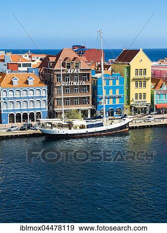 Old sailing ship in front of historic buildings in Dutch-Caribbean colonial style, waterfront, Penha, Willemstad, Lesser Antilles, Curacao, South America View Large Photo Image Stock Photo - Old sailing ship in front of historic buildings in Dutch-Caribbean colonial style, waterfront, Penha, Willemstad, Lesser Antilles, Curacao, South America. Fotosearch