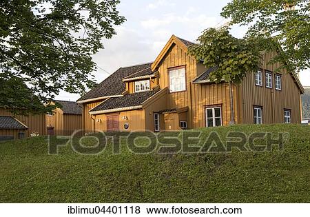 Stock Photo - Oldest house in Tromso and former customs station, Skansen, Tromso, Norway, Europe. Fotosearch