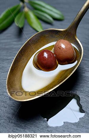 Olive oil and olives in spoon, Amphisis olives, Greek olives from Amphissa, Greece, Europe View Large Photo Image Stock Image - Olive oil and olives in spoon, Amphisis olives, Greek olives from Amphissa, Greece, Europe. Fotosearch