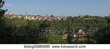 Stock Photo - Panoramic view from the castle garden to the old town and the Kobolzell church, Rothenburg ob der Tauber, Middle Franconia, Bavaria, Germany, Europe. Fotosearch