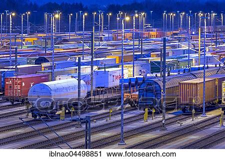 Parked freight cars on tracks at night, marshalling yard Maschen, Maschen, Lower Saxony, Germany, Europe View Large Photo Image Stock Image - Parked freight cars on tracks at night, marshalling yard Maschen, Maschen, Lower Saxony, Germany, Europe. Fotosearch