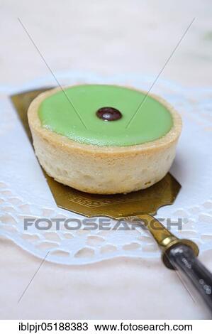 Stock Image - Patisserie on cake shovel. Fotosearch