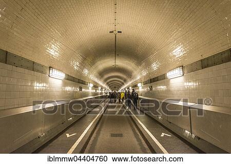 Pedestrians walk through the old Elbe tunnel, Hamburg, Germany, Europe View Large Photo Image Stock Image - Pedestrians walk through the old Elbe tunnel, Hamburg, Germany, Europe. Fotosearch