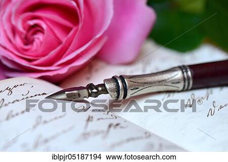 Pen and pencil with nib on book with old handwriting View Large Photo Image Picture - Pen and pencil with nib on book with old handwriting. Fotosearch