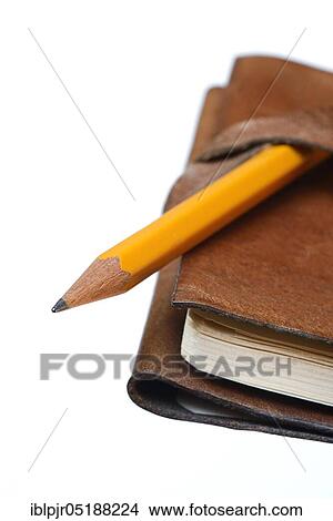 Picture - Pencil on notebook, diary, travel diary. Fotosearch
