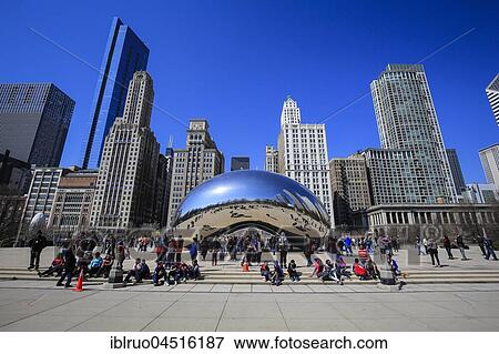 Stock Photo - People at AT &amp; T square with sculpture Cloud Gate, The Bean, Millennium Park in front of Skyline, Chicago, Illinois, USA, North America. Fotosearch