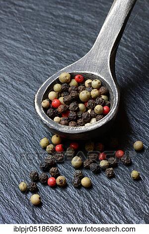Peppercorns in wooden spoon, white, black, green and ( rosa) pepper View Large Photo Image Stock Image - Peppercorns in wooden spoon, white, black, green and ( rosa) pepper. Fotosearch