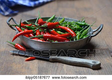 Stock Photo - Peppers ( Capsicum frutescens), Chillies, Chillies, Chillies, Chilli pepper, Chilli, Cayenne, Cayenne pepper, Piri-Piri, Tabasco, Peperoncini. Fotosearch