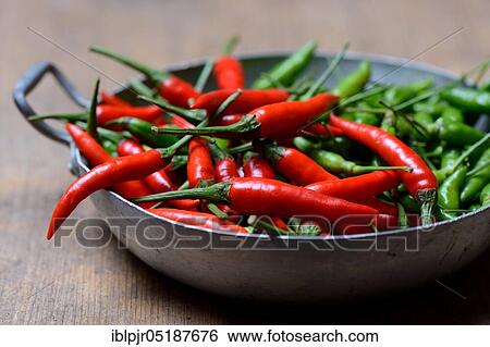 Peppers ( Capsicum frutescens), Chillies, Chillies, Chillies, Chilli pepper, Chilli, Cayenne, Cayenne pepper, Piri-Piri, Tabasco, Peperoncini View Large Photo Image Stock Photograph - Peppers ( Capsicum frutescens), Chillies, Chillies, Chillies, Chilli pepper, Chilli, Cayenne, Cayenne pepper, Piri-Piri, Tabasco, Peperoncini. Fotosearch