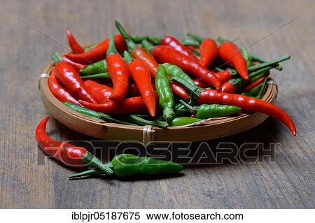 Stock Photography - Peppers ( Capsicum frutescens), Chillies, Chillies, Chillies, Chilli pepper, Chilli, Cayenne, Cayenne pepper, Piri-Piri, Tabasco, Peperoncini. Fotosearch