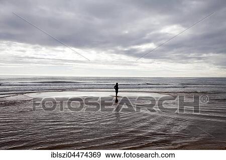 Person on small island during flood tide at Rauðasandur, Westfjords, Iceland, Europe View Large Photo Image Stock Photo - Person on small island during flood tide at Rauðasandur, Westfjords, Iceland, Europe. Fotosearch