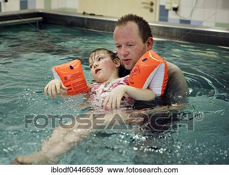 Physiotherapist during rehabilitation in the kinetotherapeutic bath, Hamburg, Germany, Europe View Large Photo Image Stock Photo - Physiotherapist during rehabilitation in the kinetotherapeutic bath, Hamburg, Germany, Europe. Fotosearch