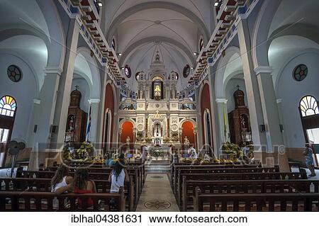 Stock Image - Pilgrimage church, Basilica of the Our Lady of El Cobre, Virgin de la Caridad del Cobre, interior, in Santiago de Cuba, Santiago de Cuba Province, Cuba, Central America. Fotosearch