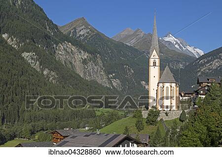 Pilgrimage church St. Vinzenz with Großglockner, Heiligenblut, High Tauern National Park, Carinthia, Austria, Europe View Large Photo Image Stock Image - Pilgrimage church St. Vinzenz with Großglockner, Heiligenblut, High Tauern National Park, Carinthia, Austria, Europe. Fotosearch