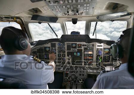 Pilot and copilot control the twin-engine propeller aircraft British Aerospace Jetstream 3200, Dominican Republic, Central America View Large Photo Image Stock Photo - Pilot and copilot control the twin-engine propeller aircraft British Aerospace Jetstream 3200, Dominican Republic, Central America. Fotosearch