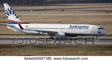 Plane Sun Express, Boeing 737-800 on Runway, Düsseldorf Airport, Düsseldorf, North Rhine-Westphalia, Germany, Europe View Large Photo Image Stock Photo - Plane Sun Express, Boeing 737-800 on Runway, Düsseldorf Airport, Düsseldorf, North Rhine-Westphalia, Germany, Europe. Fotosearch