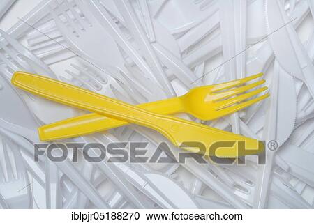 Stock Image - Plastic cutlery, plastic, plastic knife, plastic fork, plastic articles. Fotosearch