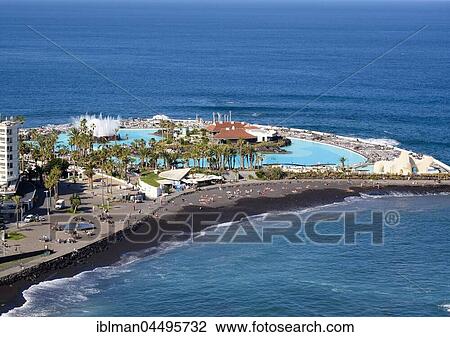 Playa Martiánez and saltwater pool Lago Martianez, Puerto de la Cruz, Tenerife, Canary Islands, Spain, Europe View Large Photo Image Stock Image - Playa Martiánez and saltwater pool Lago Martianez, Puerto de la Cruz, Tenerife, Canary Islands, Spain, Europe. Fotosearch