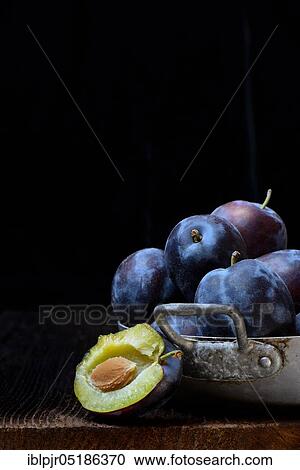 Plums (Prunus domestica domestica) in bowl View Large Photo Image Stock Image - Plums (Prunus domestica domestica) in bowl. Fotosearch