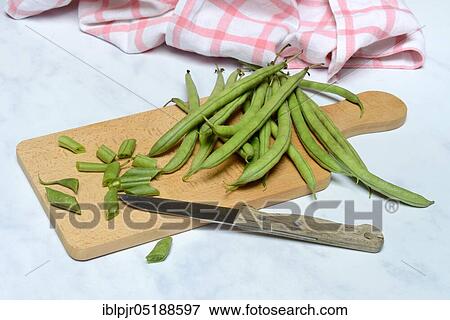 Pole bean, pole beans on wooden board with knife, crushed, shredded, Phaseolus vulgaris View Large Photo Image Stock Photo - Pole bean, pole beans on wooden board with knife, crushed, shredded, Phaseolus vulgaris. Fotosearch