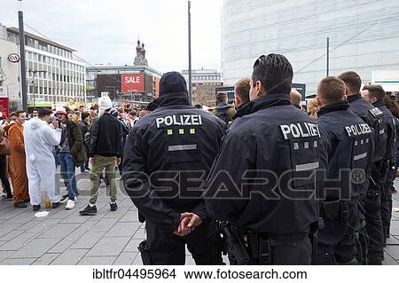 Police officers for security, Rosenmontag parade Koblenz, Koblenz, Rhineland-Palatinate, Germany, Europe View Large Photo Image Picture - Police officers for security, Rosenmontag parade Koblenz, Koblenz, Rhineland-Palatinate, Germany, Europe. Fotosearch