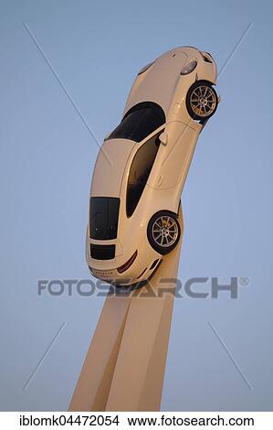 Picture - Porsche 911 Carrera 2015 on white stele, Sculpture Inspiration 911, artist Gerry Judah, Porsche Museum, Stuttgart-Zuffenhausen, Stuttgart, Baden-Württemberg, Germany, Europe. Fotosearch