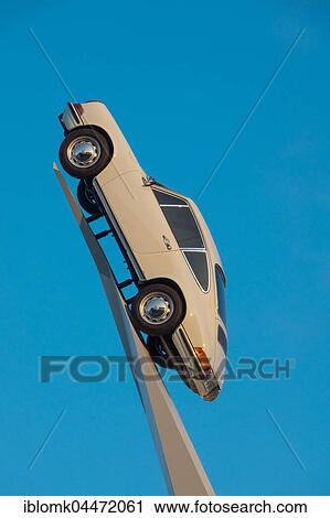 Stock Image - Porsche 911 F-model from 1970 on white stele, Sculpture Inspiration 911, artist Gerry Judah, Porsche Museum, Stuttgart-Zuffenhausen, Stuttgart, Baden-Württemberg, Germany, Europe. Fotosearch