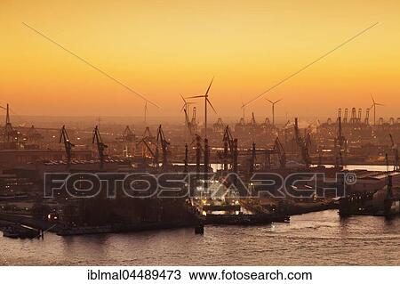 Port of Hamburg with wharfs Blohm and Voss, sunset, Hamburg, Germany, Europe View Large Photo Image Stock Image - Port of Hamburg with wharfs Blohm and Voss, sunset, Hamburg, Germany, Europe. Fotosearch