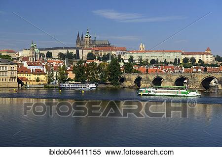 Prague Castle with St. Vitus Cathedral on Castle Hill Hradcny, Castle District, Vltava River, tourist boats, Prague, Czech Republic, Europe View Large Photo Image Stock Photography - Prague Castle with St. Vitus Cathedral on Castle Hill Hradcny, Castle District, Vltava River, tourist boats, Prague, Czech Republic, Europe. Fotosearch