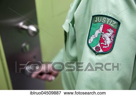 Stock Photo - Prison guard unlocking jail cell, Düsseldorf prison, North Rhine-Westphalia, Germany, Europe. Fotosearch