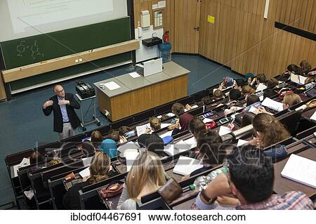 Stock Image - Professor and students during a lecture in the auditorium, Heinrich-Heine University, Düsseldorf, North Rhine-Westphalia, Germany, Europe. Fotosearch