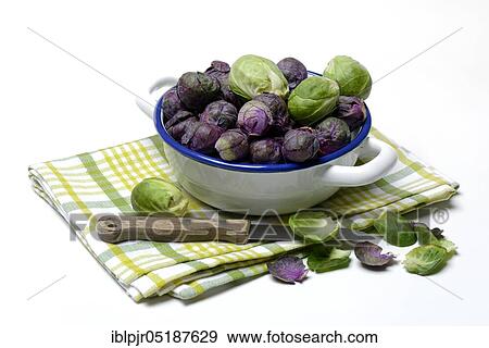 Purple and green Brussels sprouts in a bowl View Large Photo Image Stock Photo - Purple and green Brussels sprouts in a bowl. Fotosearch
