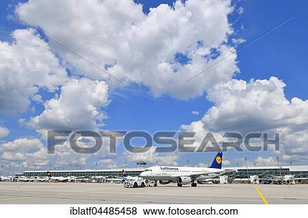 Push-back truck when towing the Lufthansa Airbus A 319-100, Airport Munich, Upper Bavaria, Germany, Europe View Large Photo Image Stock Photo - Push-back truck when towing the Lufthansa Airbus A 319-100, Airport Munich, Upper Bavaria, Germany, Europe. Fotosearch