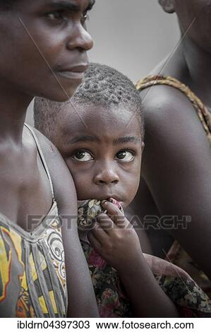 Pygmy woman and child, people of Baaka, or Baka, or Ba'aka, Grand Batanga, Southern Region, Cameroon, Africa View Large Photo Image Stock Image - Pygmy woman and child, people of Baaka, or Baka, or Ba'aka, Grand Batanga, Southern Region, Cameroon, Africa. Fotosearch