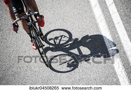 Racing cyclists with shadow, cycling race Volta de Catalunya, Catalunya Tour 2017, Barcelona, Catalonia, Spain, Europe View Large Photo Image Stock Photography - Racing cyclists with shadow, cycling race Volta de Catalunya, Catalunya Tour 2017, Barcelona, Catalonia, Spain, Europe. Fotosearch