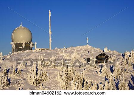 Stock Image - Random, summit cross and Zwieseler Cottage in Snow, Big Arber, Natural Preserve Bavarian Forest, Lower Bavaria, Bavaria, Germany, Europe. Fotosearch
