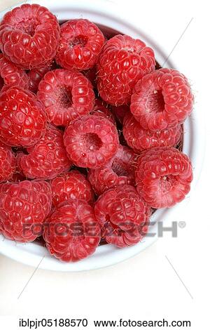 Stock Image - Raspberries in skin, Rubus idaeus. Fotosearch