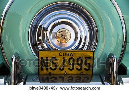 Stock Photo - Rear view of an old Cadillac, spare wheel cover, Power Meet vintage car rally, Västerås, Sweden, Europe. Fotosearch