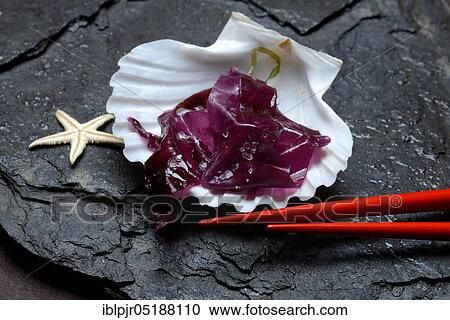 Red alga with sea salt in mussel shell and chopsticks, Palmaria palmata, Wild Dulse View Large Photo Image Stock Image - Red alga with sea salt in mussel shell and chopsticks, Palmaria palmata, Wild Dulse. Fotosearch