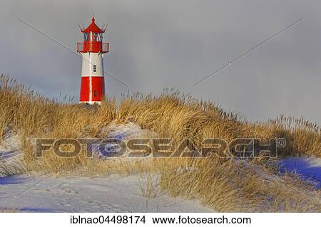 Red and white striped lighthouse List East in the dunes, Ellenbogen, List, Sylt, North Frisia, Schleswig-Holstein, Germany, Europe View Large Photo Image Picture - Red and white striped lighthouse List East in the dunes, Ellenbogen, List, Sylt, North Frisia, Schleswig-Holstein, Germany, Europe. Fotosearch